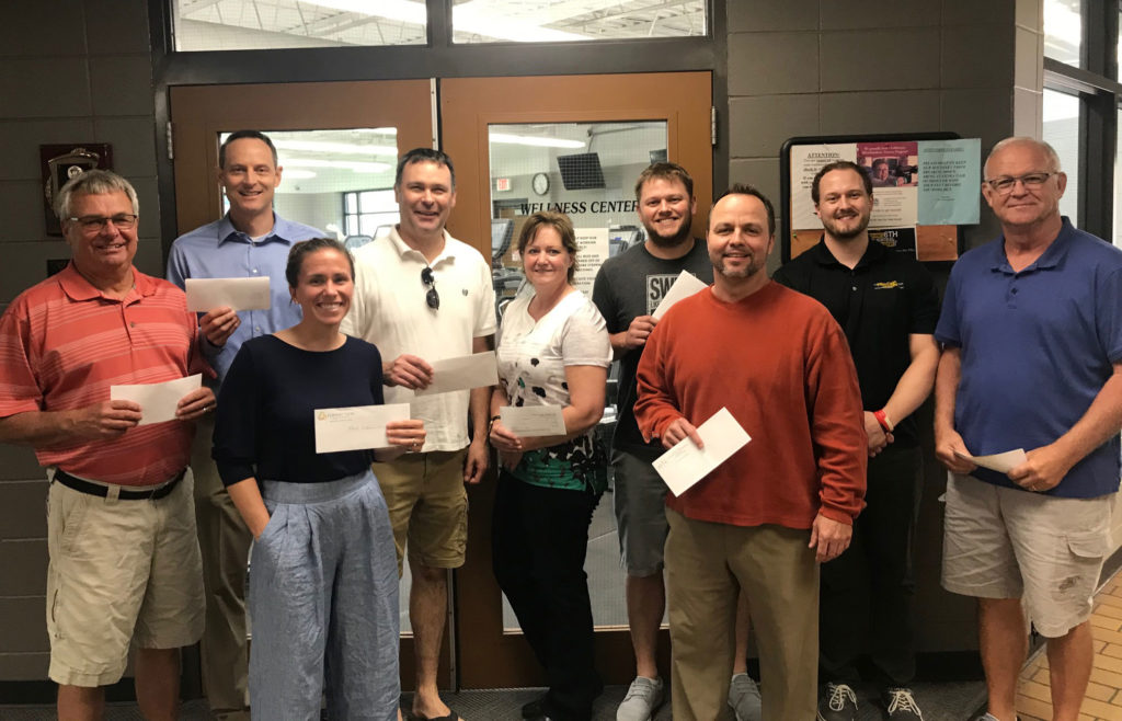 Members of the Fort Madison Family YMCA Board of Directors present their donations for the 2019 Sustaining Campaign. Members pictured above are Tim Lamm, Roger Griswold, Jill Stoll, Ryan Daly, Jen Fett, Wes Holtkamp, Steve Eschman, Justin Menke, and John Owen.